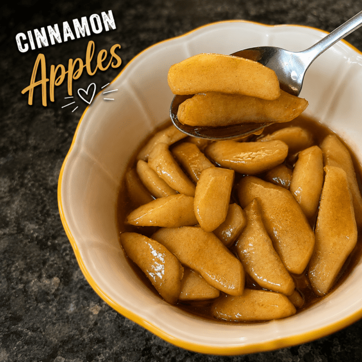 cinnamon apples in bowl with spoon