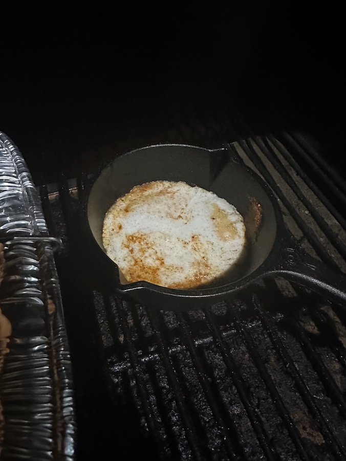 Melted butter and seasoning in small cast iron skillet