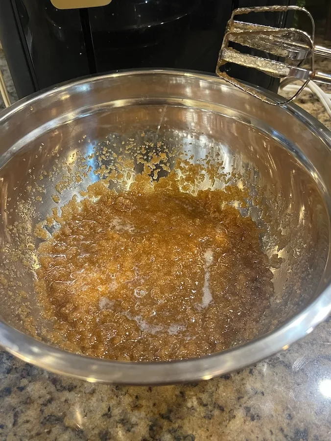 Brown butter, sugar, eggs and vanilla in the mixer