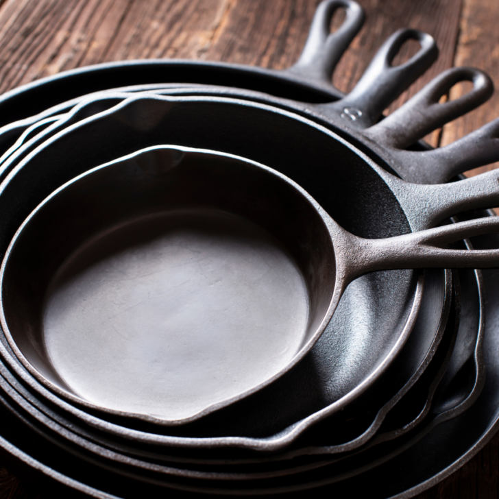 cast iron skillets nestled together