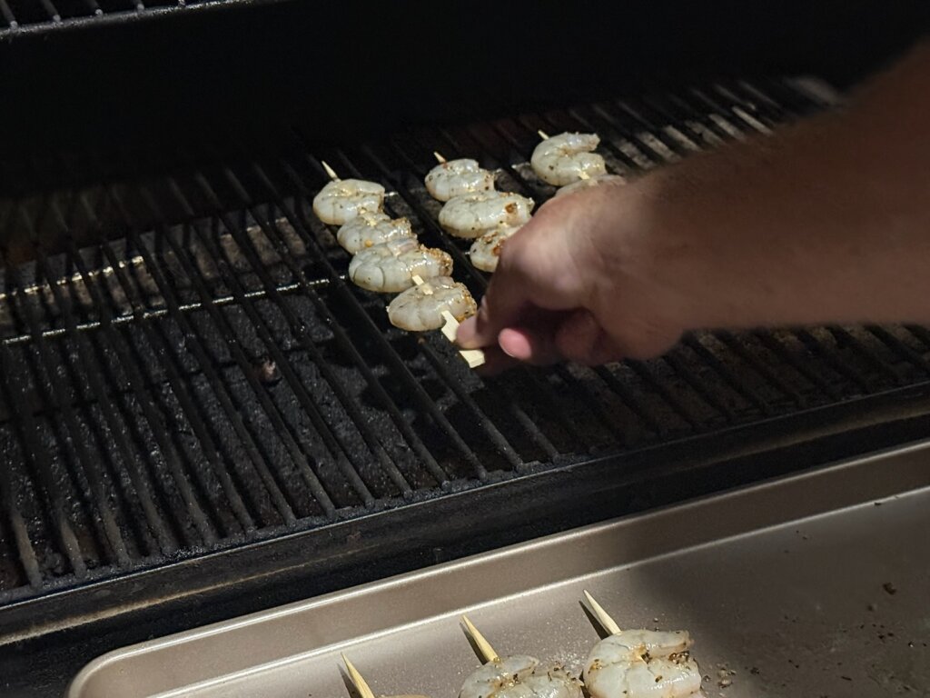 skewered shrimp on smoker