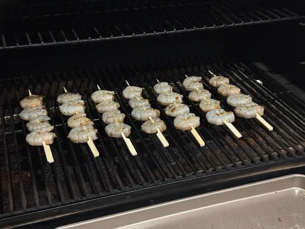 skewered shrimp on the grill