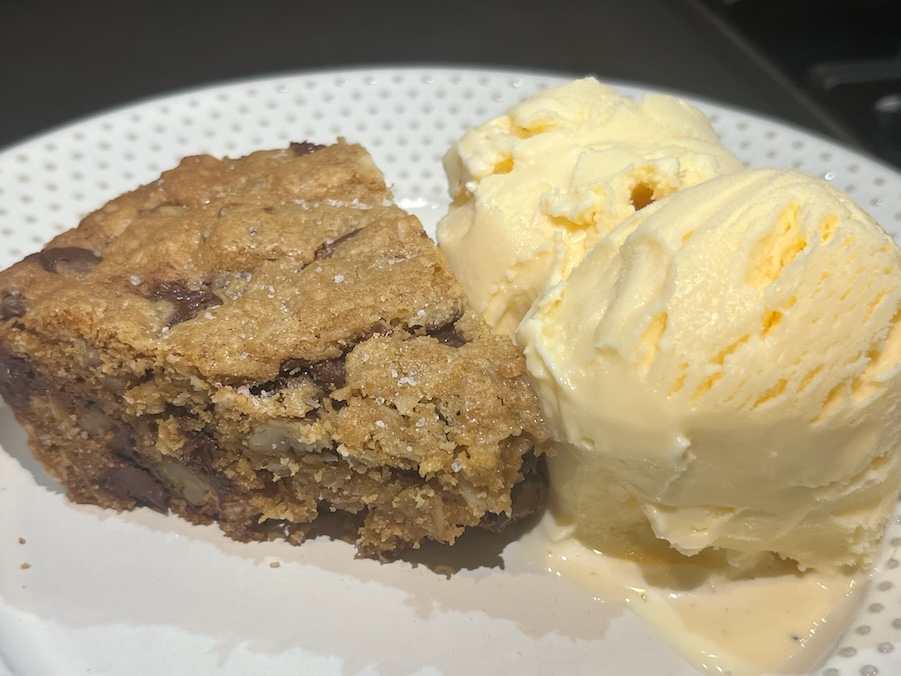 serving of oatmeal skillet cookie with a scoop of ice cream
