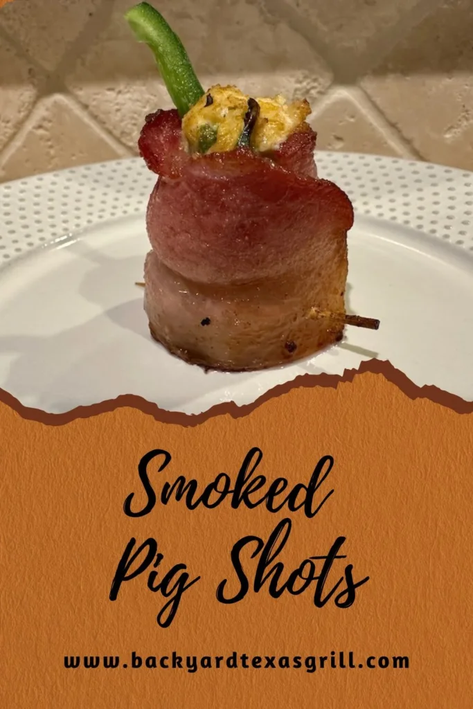 smoked pig shot on plate with text reading smoked pig shots; pin for pinterest