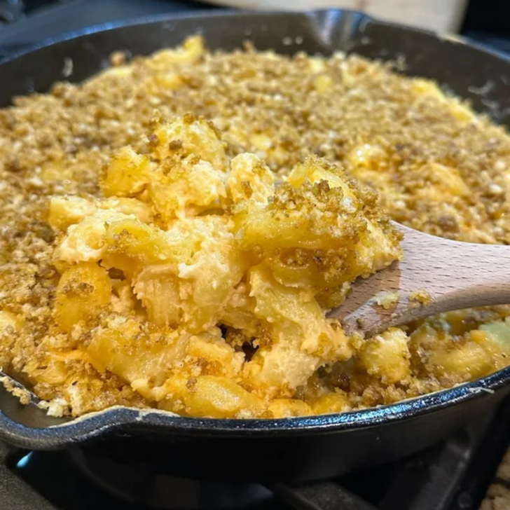 pasta in cast iron skillet with spoon