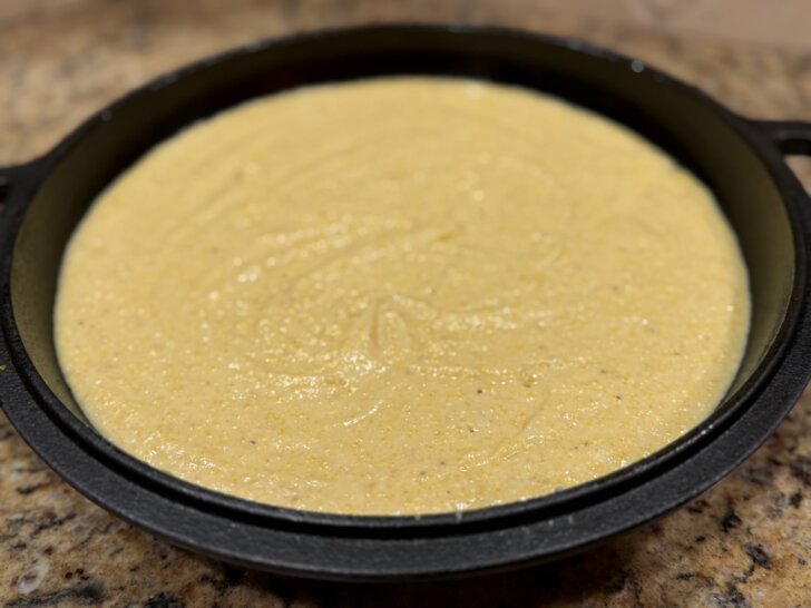 cornbread batter, mixed in cast iron skillet