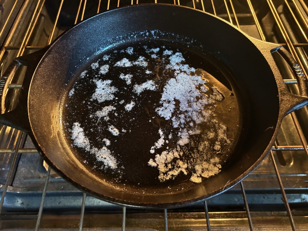 cast iron skillet with melted butter