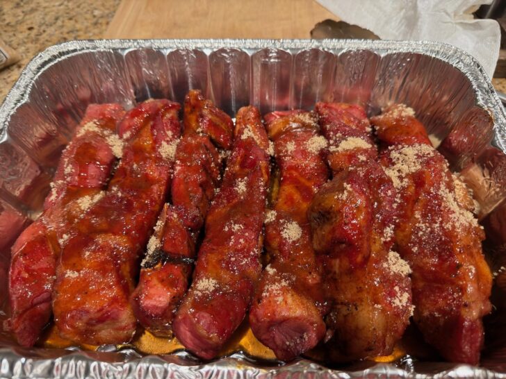 Adding brown sugar to Smoked Honey Bourbon Country-Style Ribs