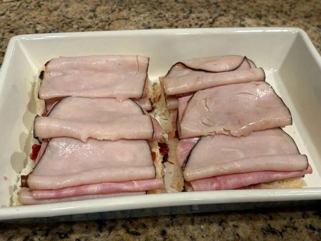 turkey on sliders in casserole dish