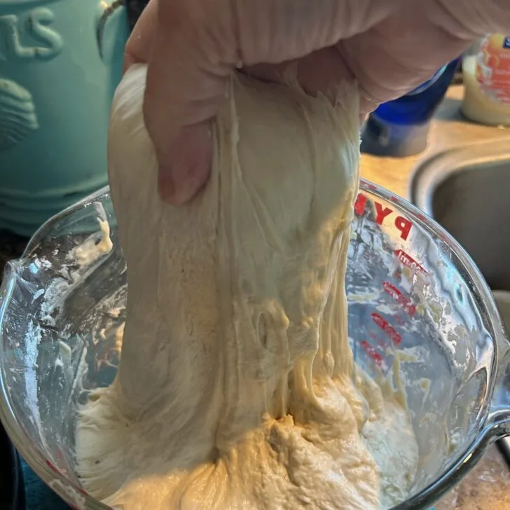 Same Day Jalapeno Cheddar Sourdough Rolls (dough in bowl during stretch and fold phase)