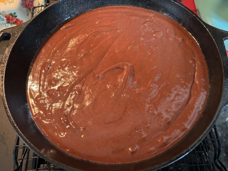 texas sheet cake batter in cast iron skillet