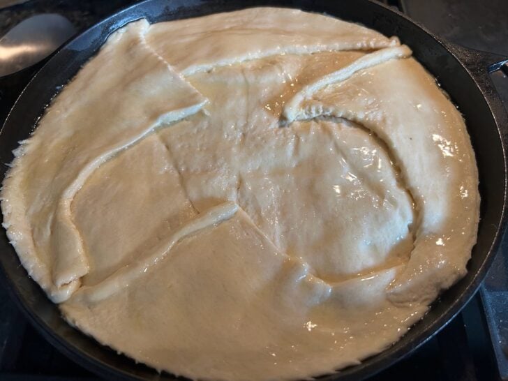 crescent roll crust brushed with melted butter