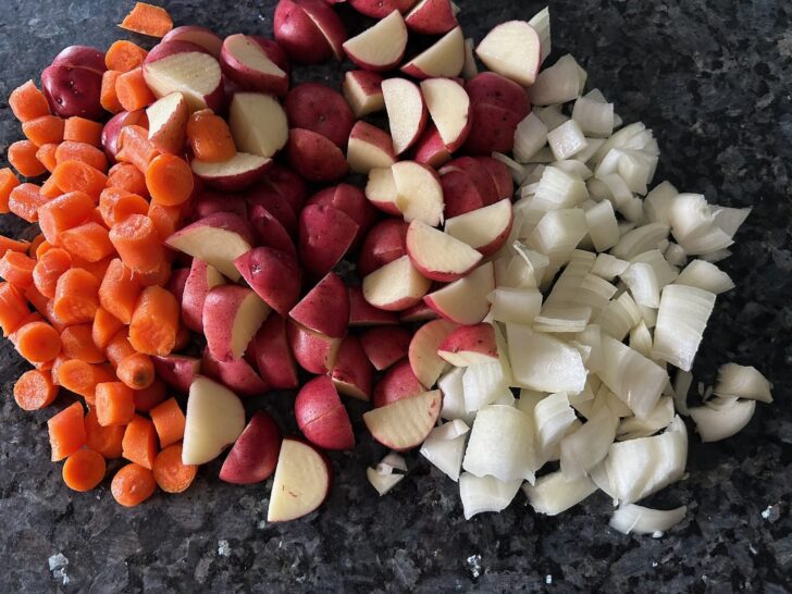 chopped potatoes, carrots, and onions