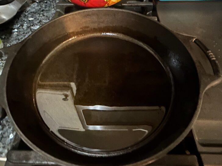 oil in cast iron skillet on stovetop