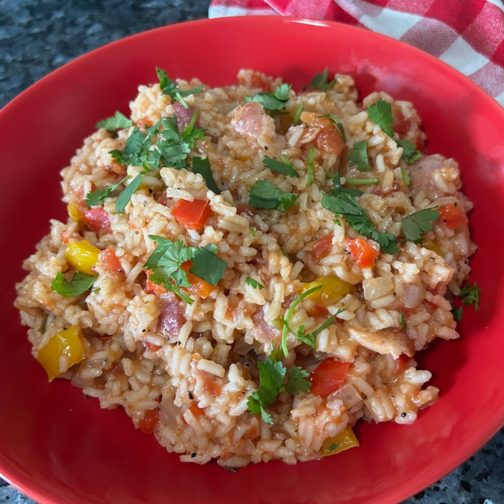 spanish rice in red bowl