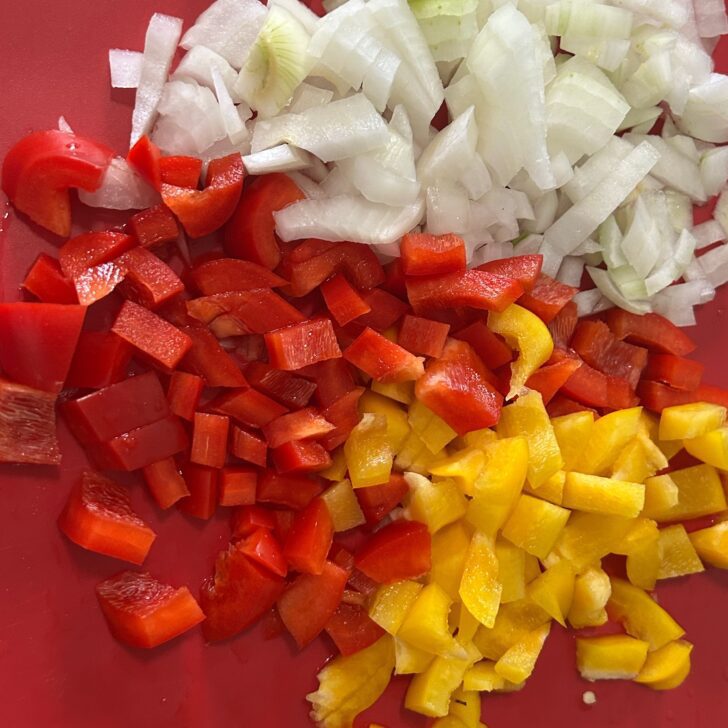 chopped onions, red peppers, yellow peppers