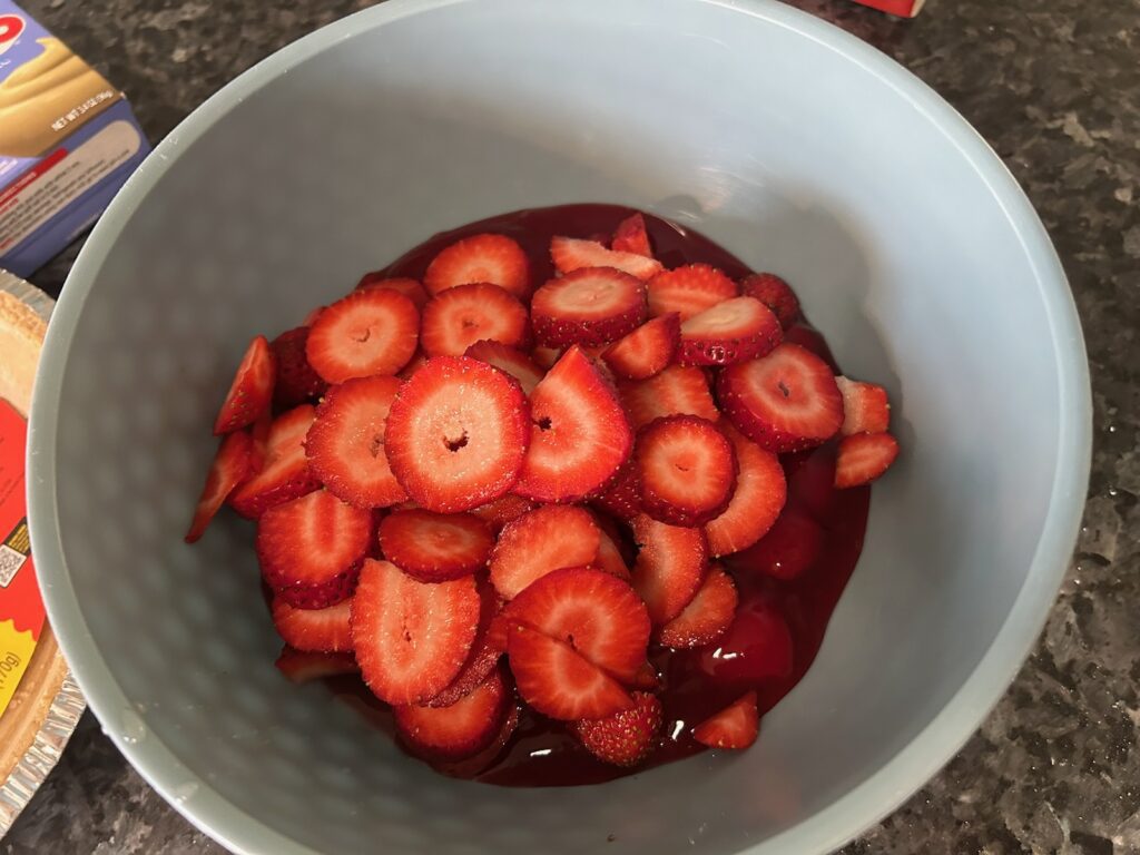 fresh strawberries sliced and worked into canned pie filling