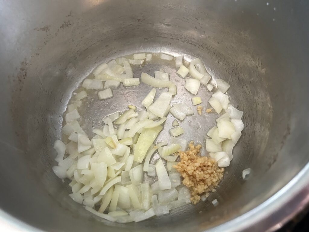 onions and garlic sauteeing in instant pot