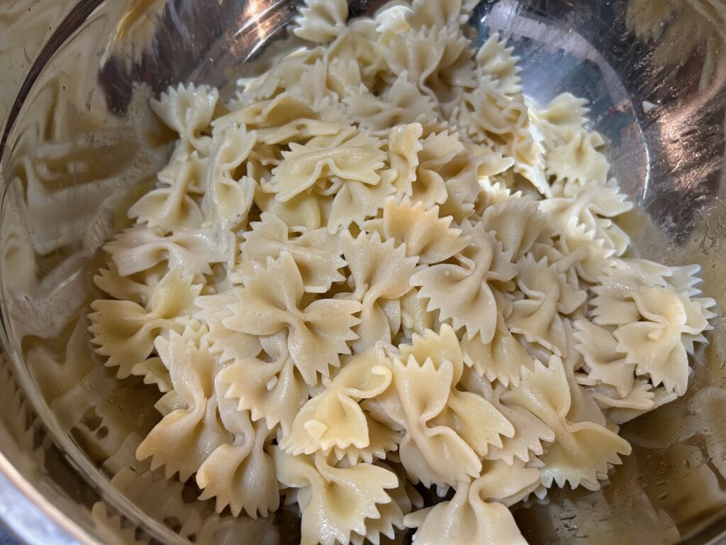 cooked bowtie pasta in bowl