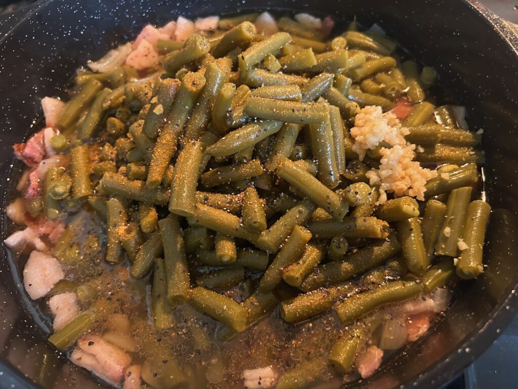 green beans in pan on stove