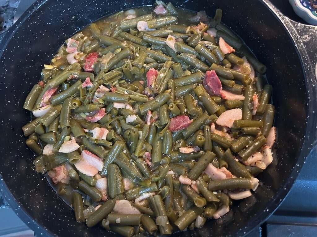 green beans simmering in pot on stove