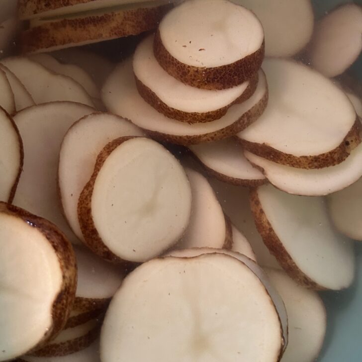sliced raw russet potatoes