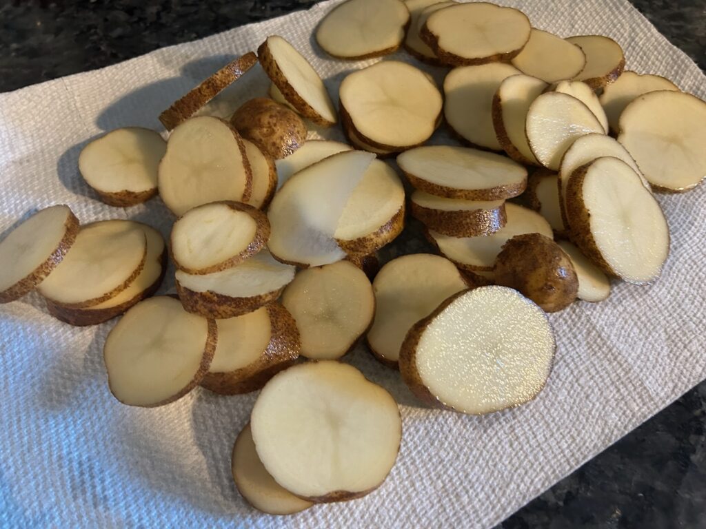 sliced potatoes, paper-towel dried