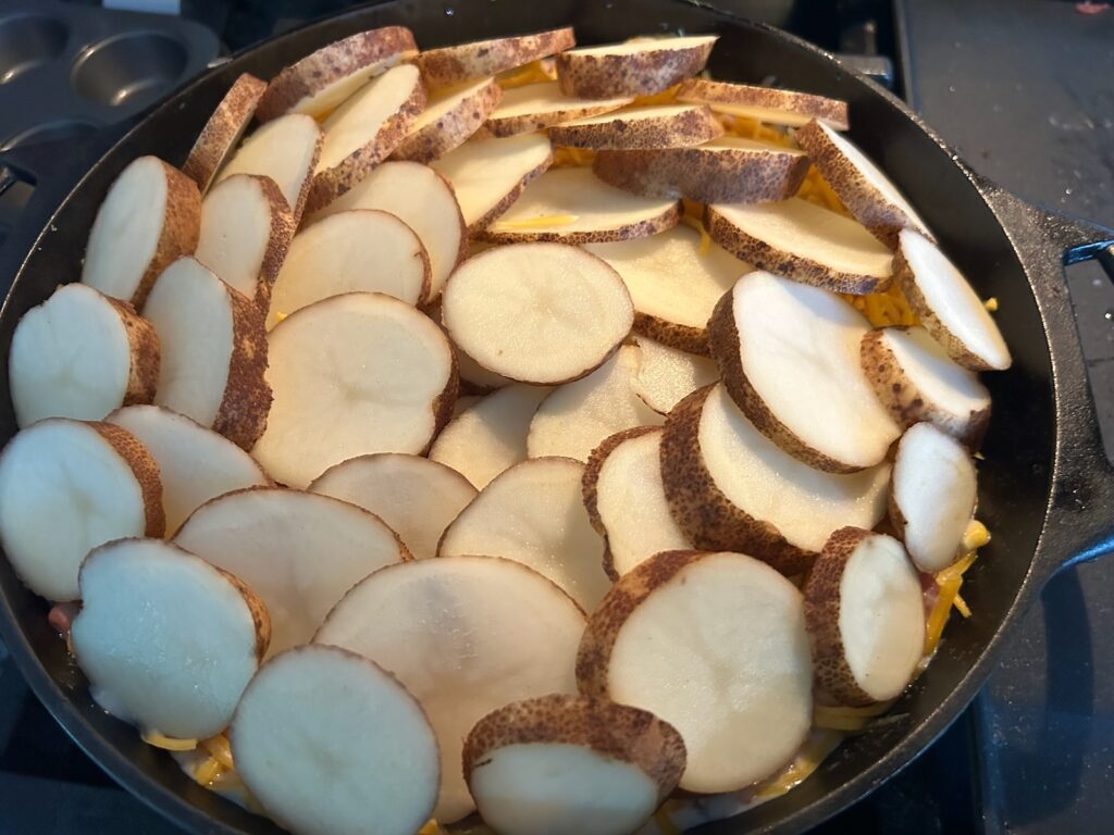 layered potatoes on top of casserole