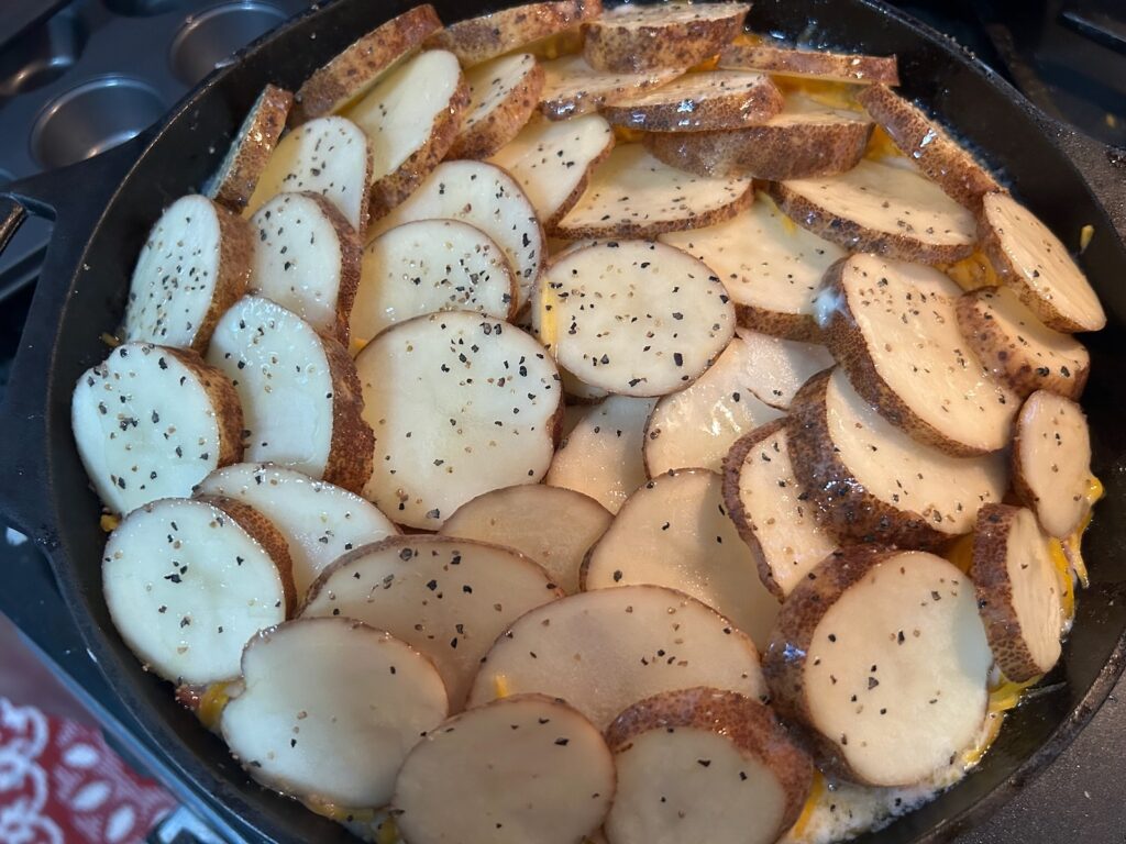 seasoned potatoes on top of casserole