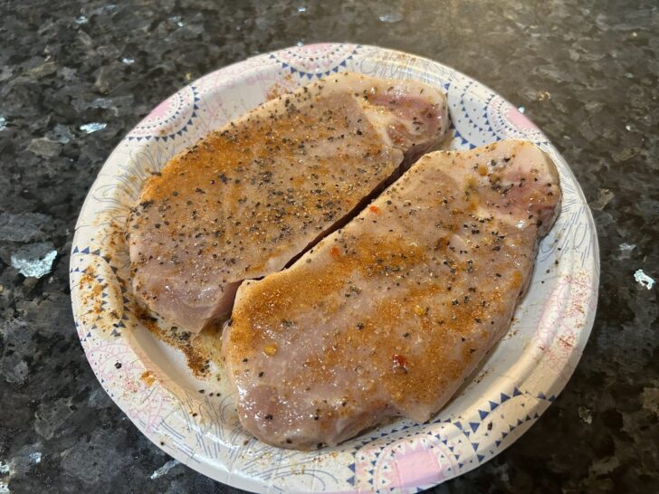 seasoned pork chops prior to grilling