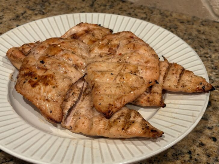 Simple grilled chicken breast on plate