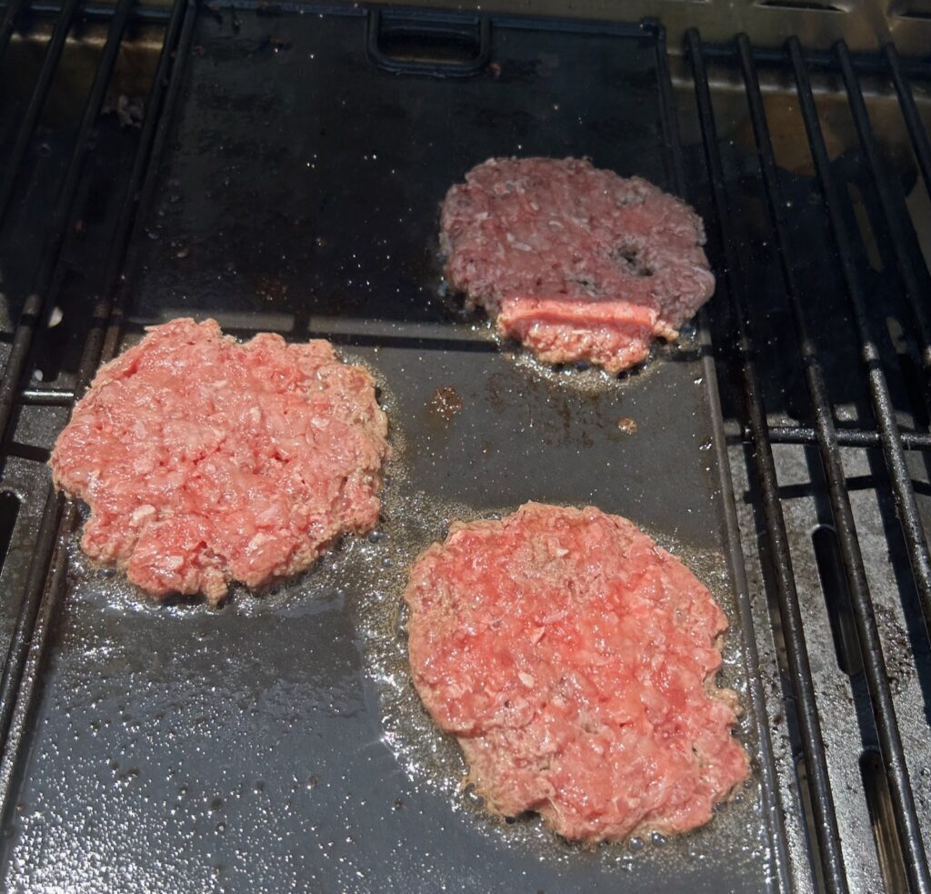 ground beef patties on grill