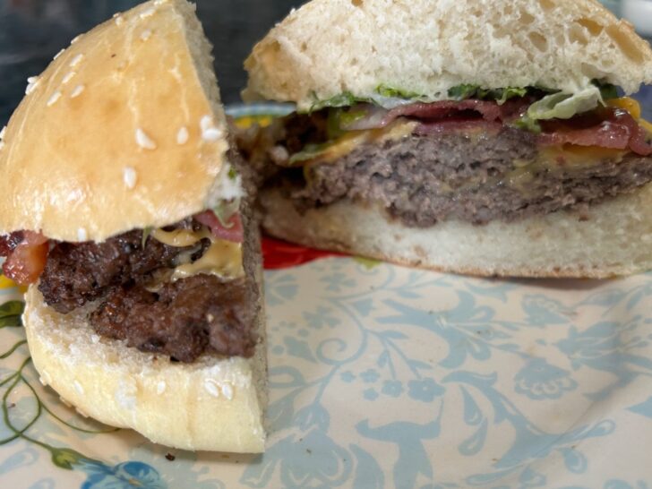 bacon double cheeseburger, cut in half