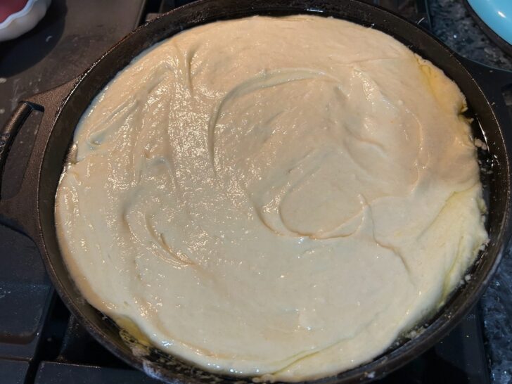 pineapple upside down cake batter in skillet