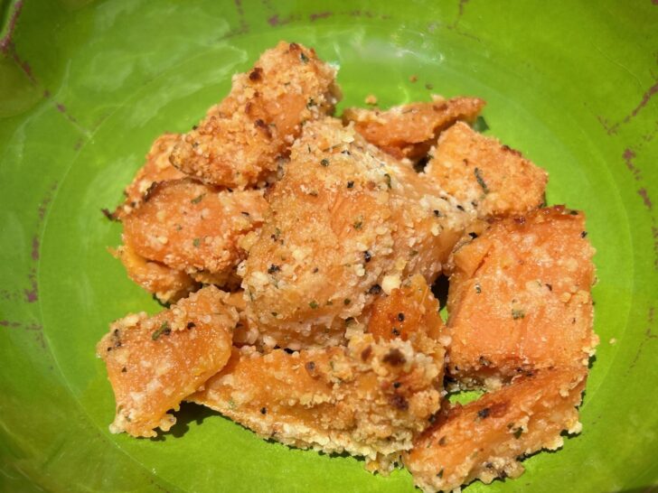 roasted sweet potatoes in green bowl
