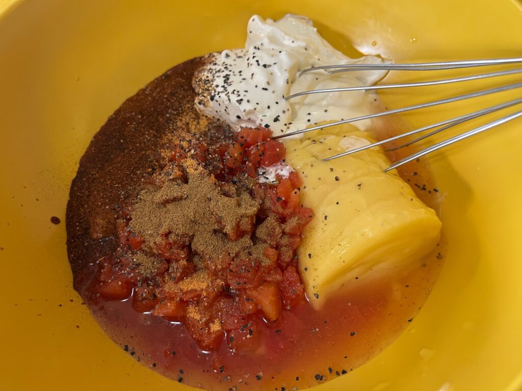 creamed soups in bowl with diced tomatoes