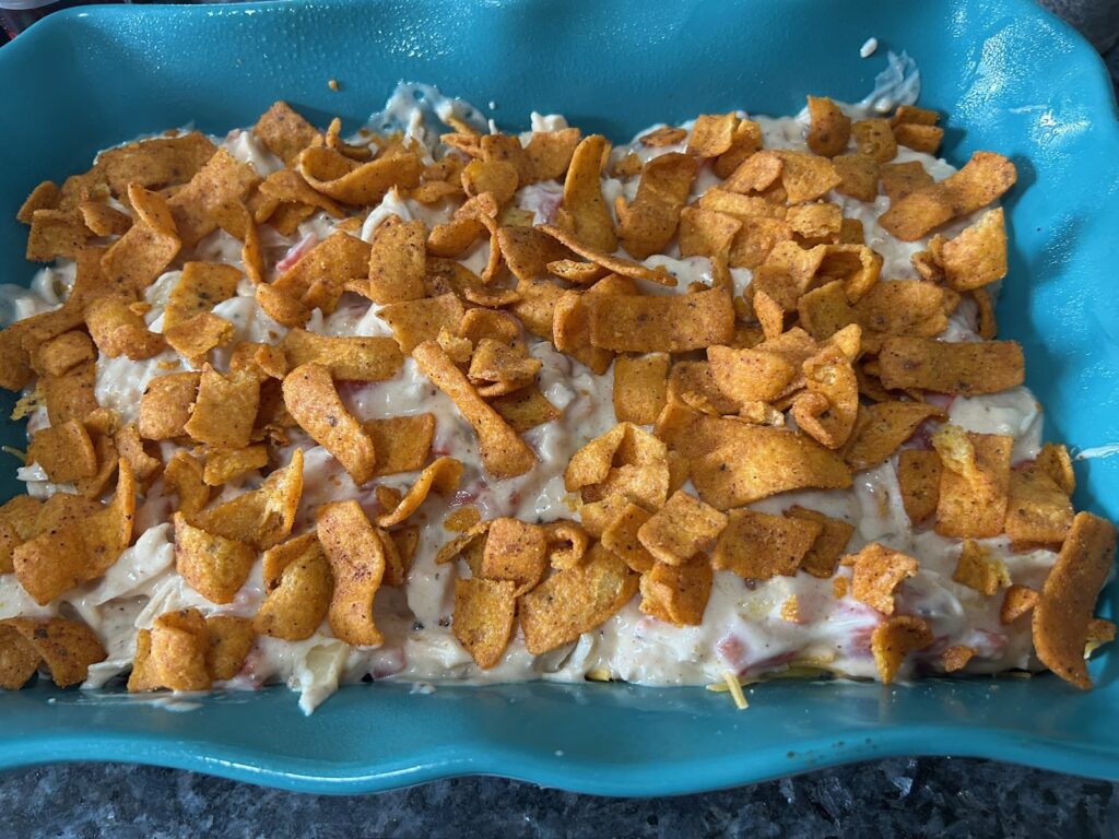 Easy King Ranch Chicken (Texas Style) layering in casserole dish