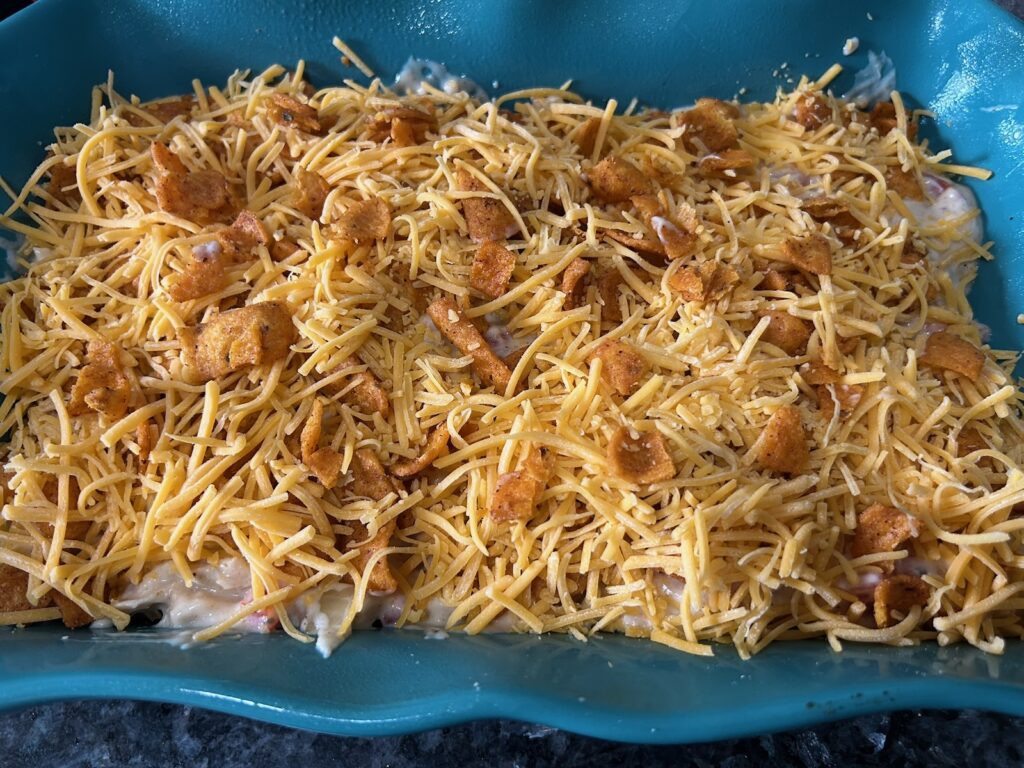 Easy King Ranch Chicken (Texas Style) layering in casserole dish