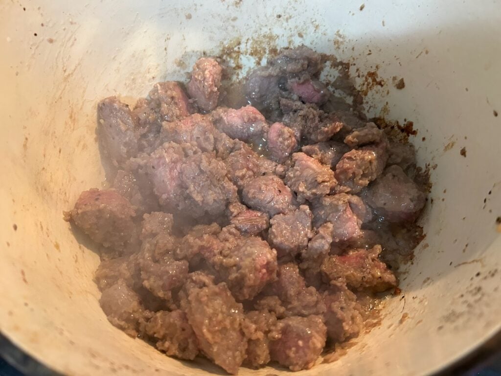 beef searing on stove