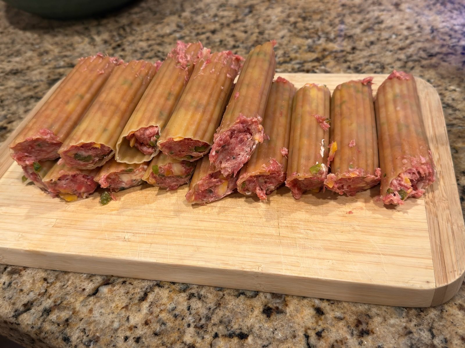 Smoked Shotgun Shells (Bacon-Wrapped Manicotti) before baking
