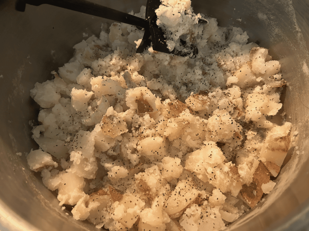seasoned potatoes in pan