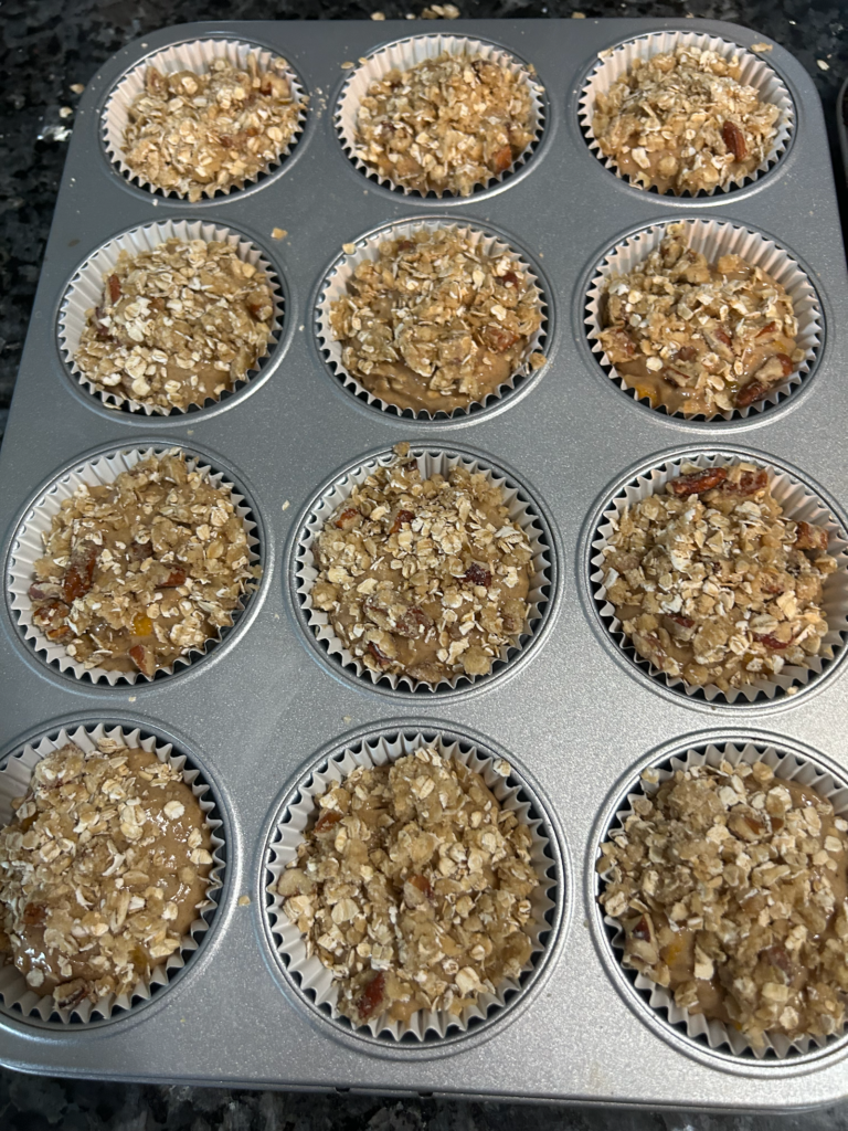 Easy Peach Streusel Muffin batter wtih streusel topping