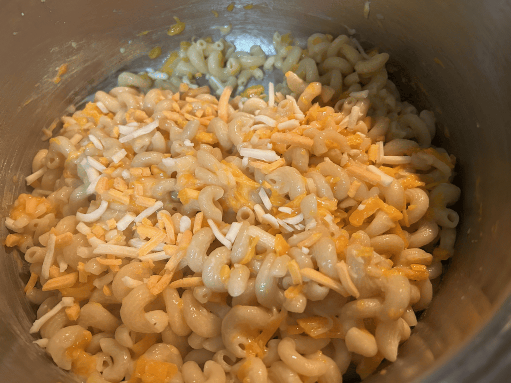 cooked pasta with cheese and butter