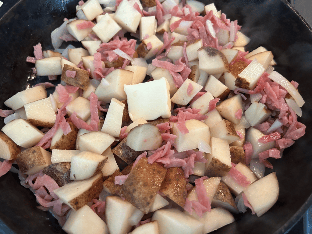 potatoes and ham in skillet
