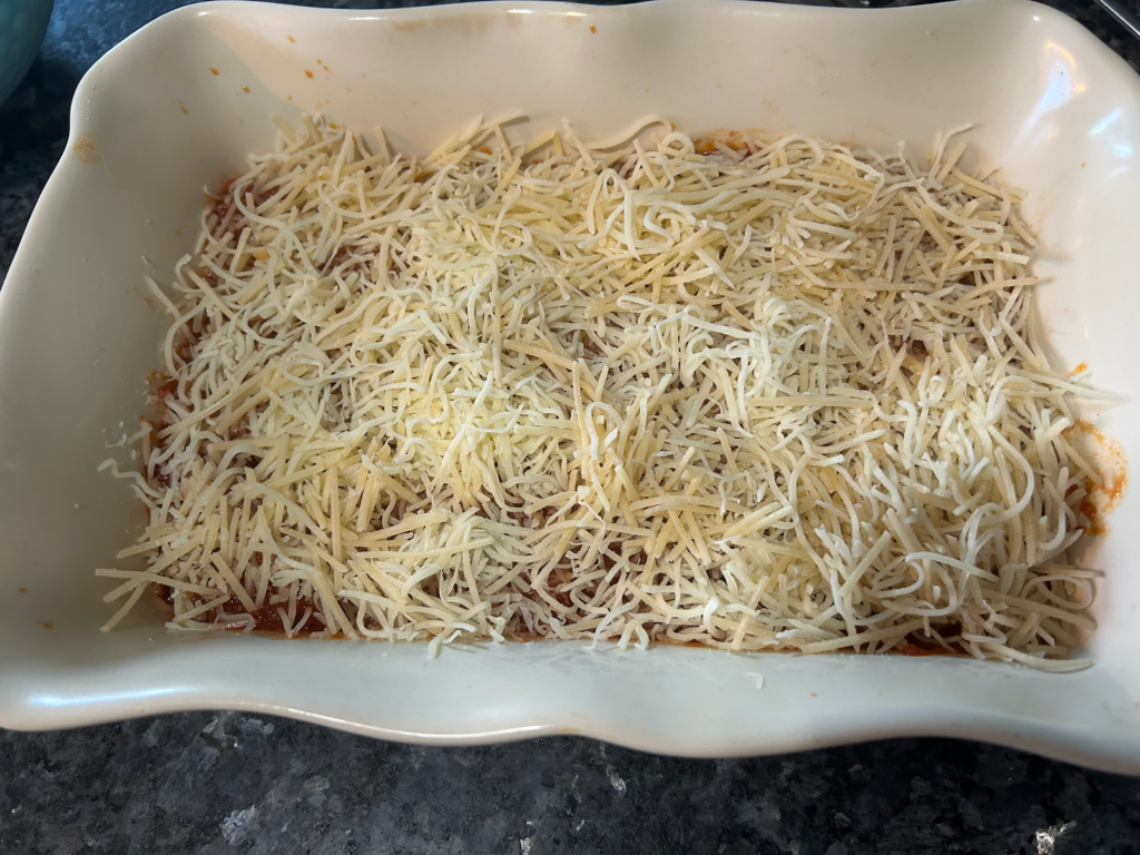Easy Cheesy Baked Tortellini with Homemade Meat Sauce layers