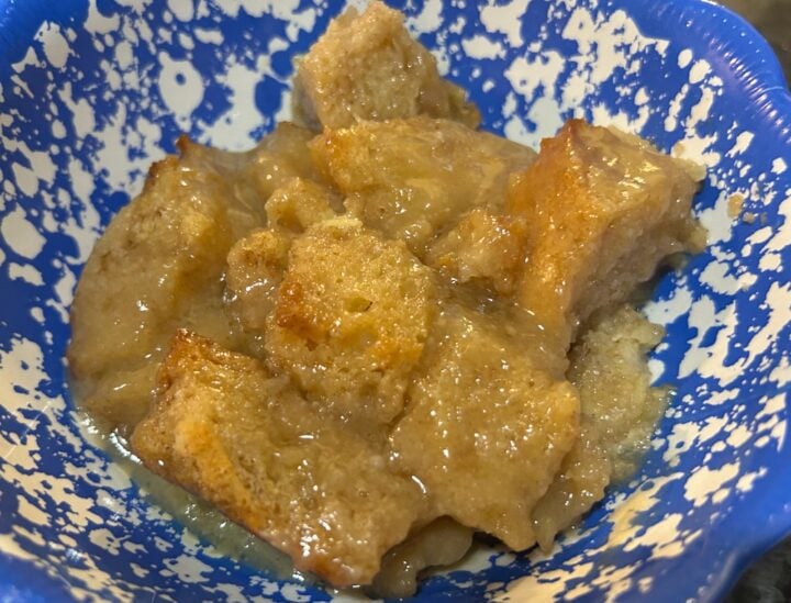 Old-Fashioned Bread Pudding with Brown Sugar Vanilla Sauce in bowl