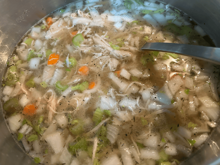 dumpling broth simmering on store