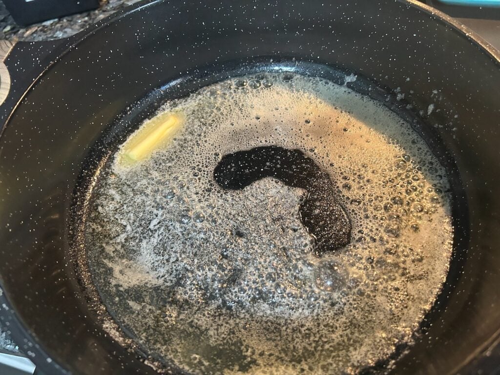 butter melted in pan