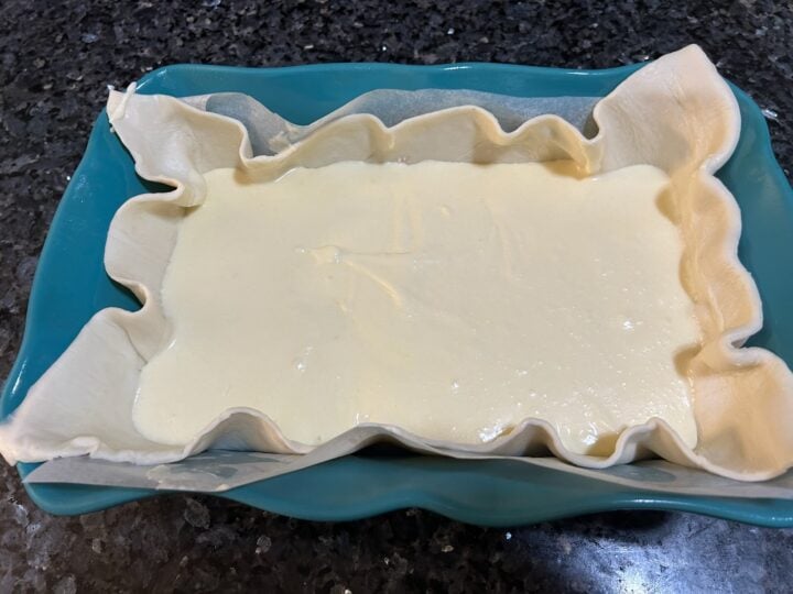 Southern Gooey Butter Bars with Cherries ready to go in oven