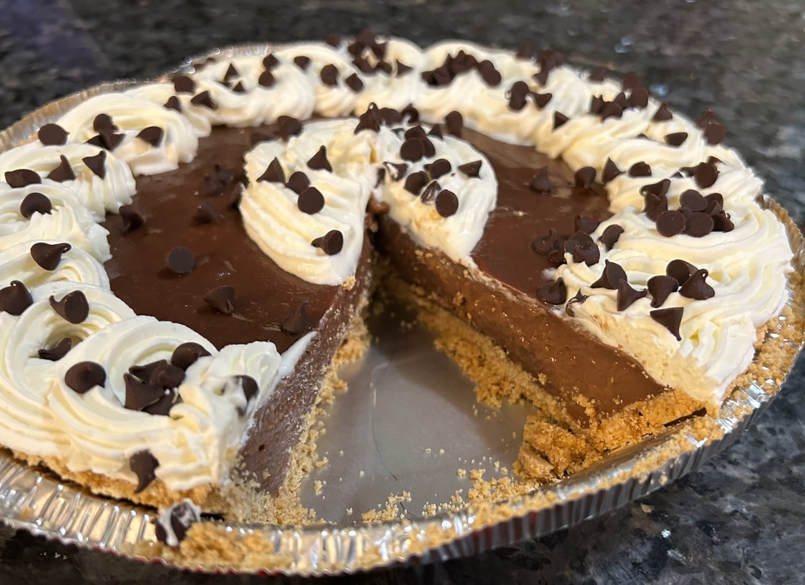chocolate pie with one slice missing